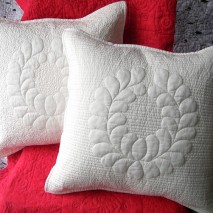 Trapunto feathered wreath pillow Trapunto feathered wreath pillow